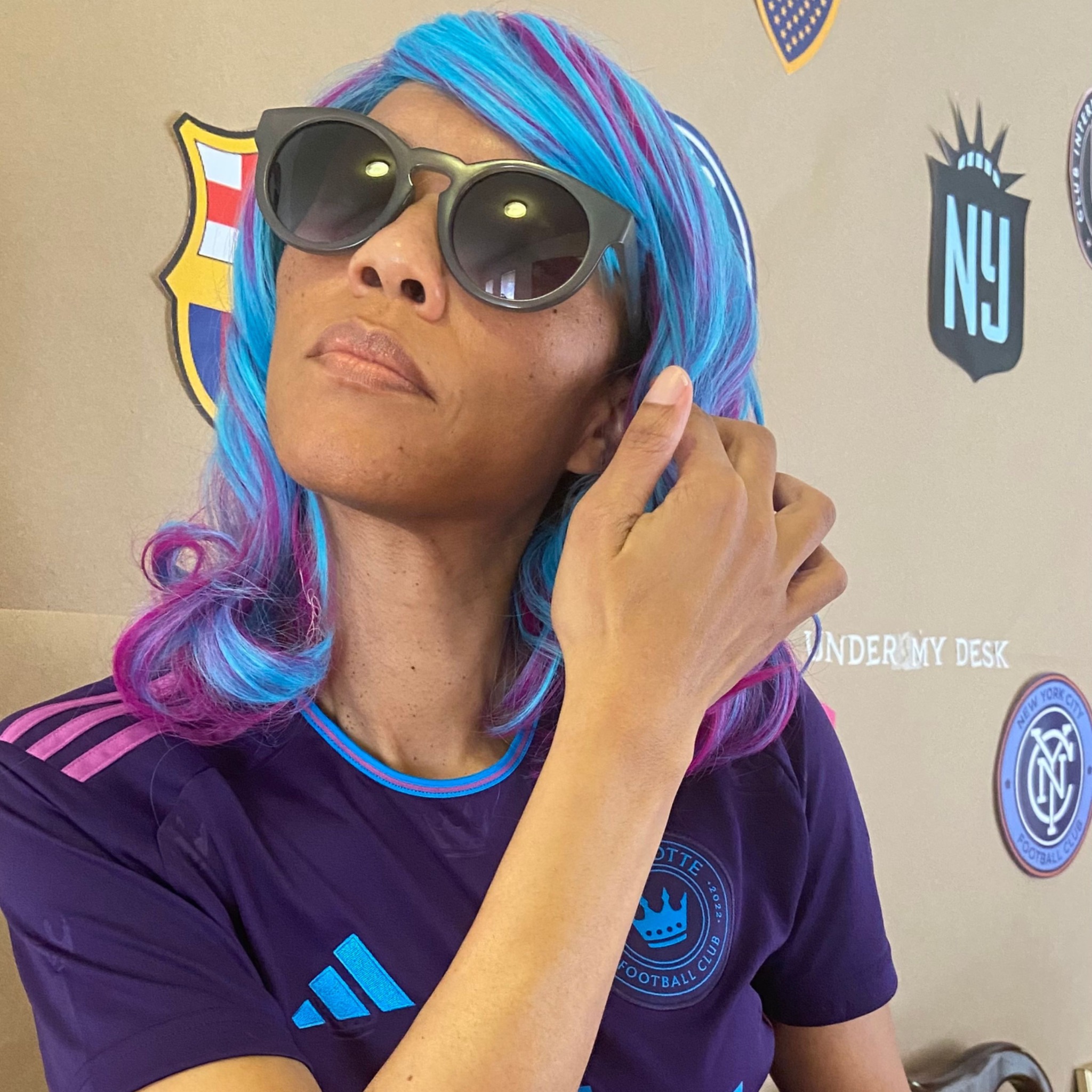 Qiana Martin wearing a soccer jersey